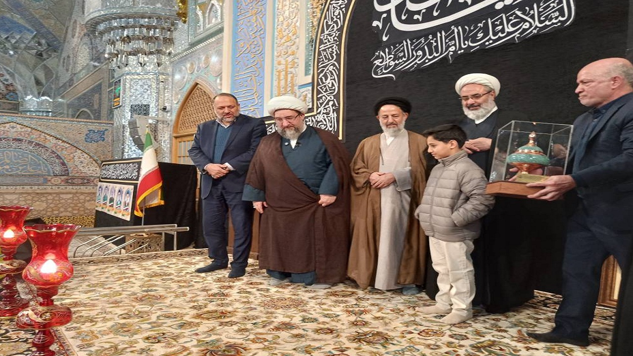 تجلیل از خانواده شهید مالک رحمتی